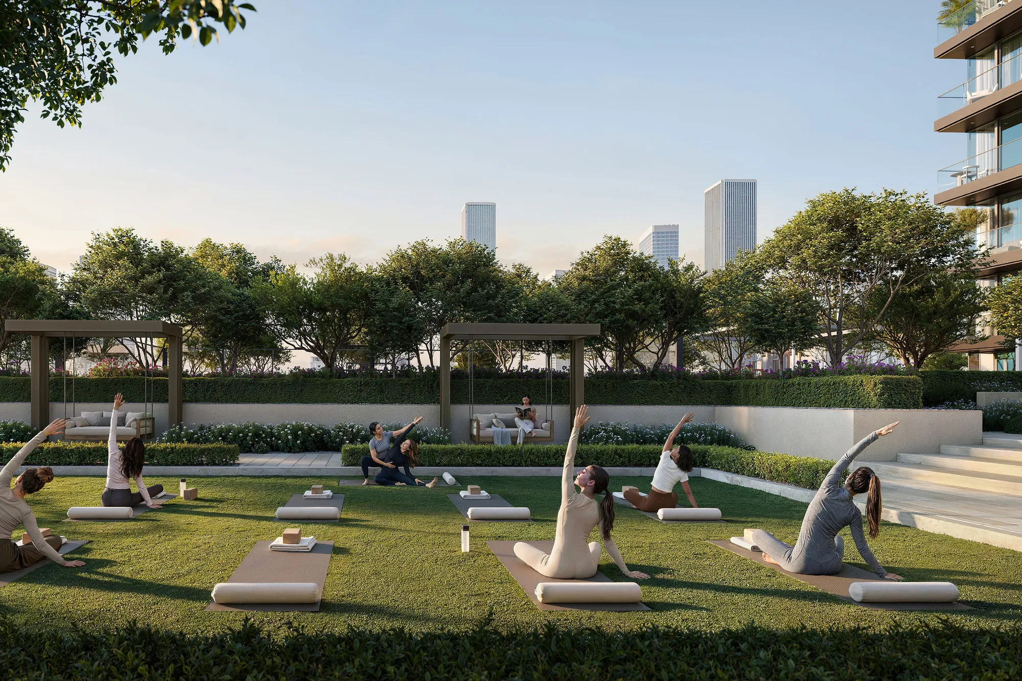 Yoga class on a garden lawn framed by hedges and swing seats